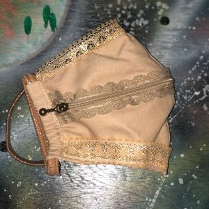 Gold “Zip the lips” face mask